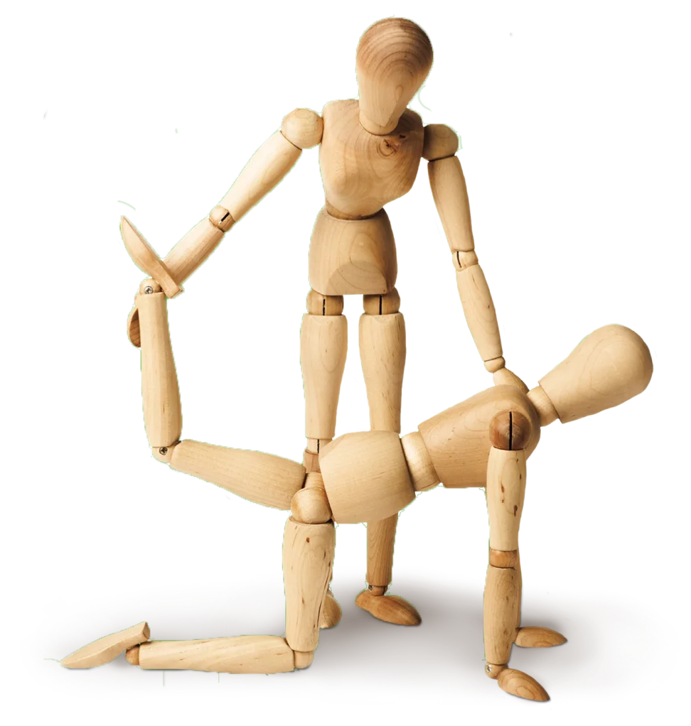 Holzfiguren bei physiotherapeutischer Übung